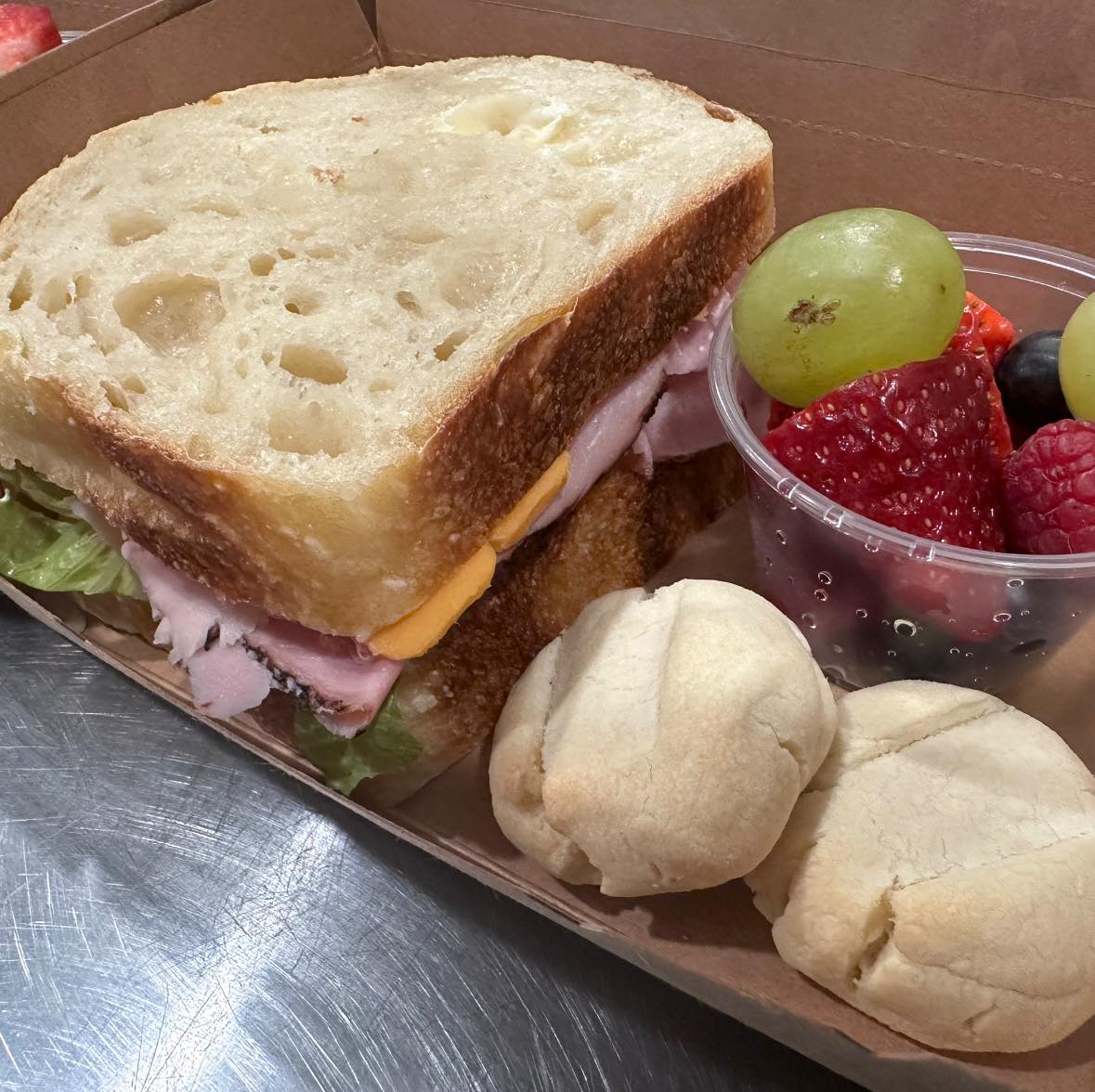 Sandwich lunch box on fresh sourdough bread